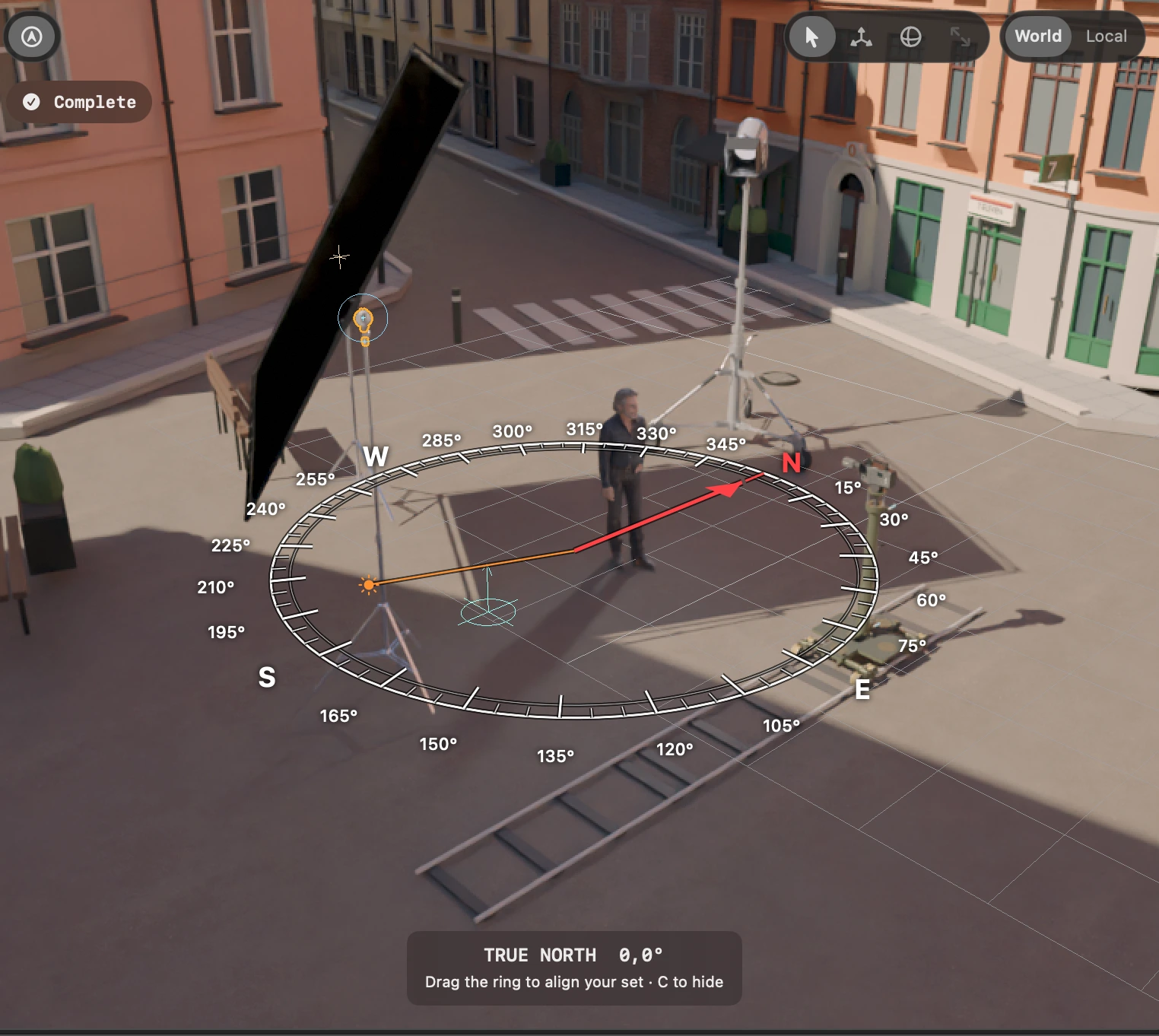 CineTwin outdoor lighting setup with a True North compass, lights and a camera dolly in a sunlit street